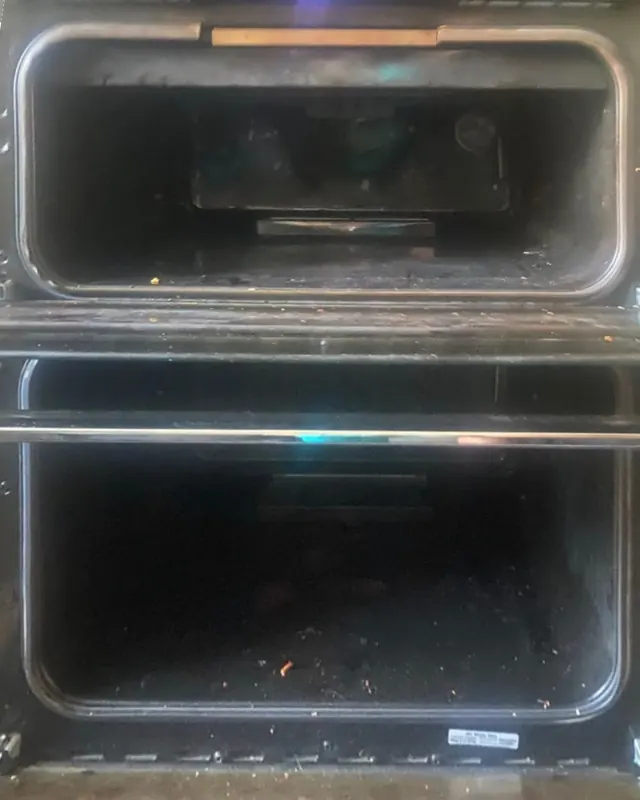 A dirty double oven before cleaning